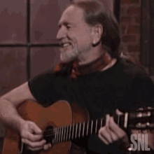 laughing willie nelson saturday night live chuckle laugh