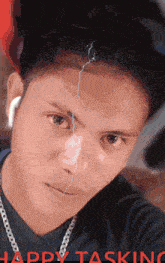 a picture of a man with a lightning bolt on his forehead with the words happy tasking below him