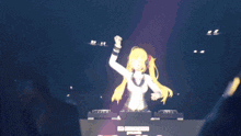 a girl is dancing on a stage in front of a sign that says nintendo