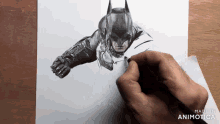 a drawing of batman is being made by made in animatica