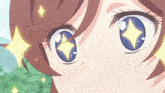 a close up of a girl 's eyes with a diamond in them