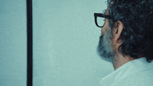 a man with a beard and glasses says so i 'm f * cked