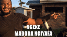a man standing in front of a microphone with the words ngeke madoda ngiyafa written on the bottom