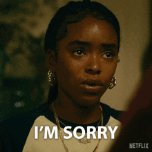 a woman with a tear running down her face says i 'm sorry on a netflix ad
