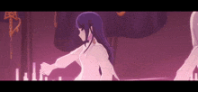 a girl with purple hair and a white dress is standing next to another girl .