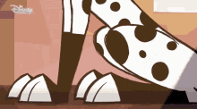 a dalmatian 's paws are shown in a disney animated series