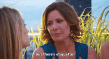 a woman says " but there 's etiquette " while talking to another woman .