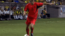 a soccer player with the number 15 on his jersey