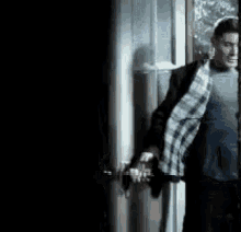 Jensen Ackles Opening Door GIF - Jensen Ackles Opening Door Spn GIFs