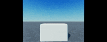 a white cube is sitting on a tiled floor with a blue sky behind it