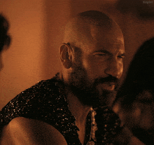 a man with a beard is saying lemme tell you something telemachus