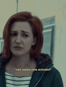 a close up of a woman with the words " sad puppy eyes activated " on the bottom