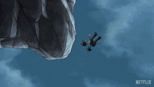 a cartoon of a man falling off a cliff with a netflix logo in the corner