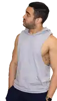 a man wearing a grey tank top has a tattoo on his right arm