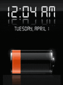 a digital clock displays the time as 12:04 am on tuesday april 1