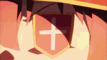 a close up of a person 's face with a shield with a cross on it .