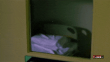 a blurred image of a person behind a window with the word full on the bottom right