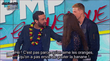 two men and a woman are standing in front of a sign that says pimp