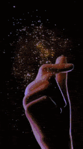 a collage of a woman and a man with gold sparkles