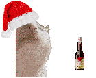 a santa hat sits next to a bottle of smirnoff