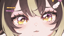 a close up of a girl 's eyes with a star in the middle