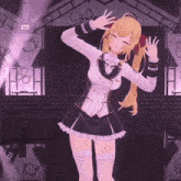 a girl in a black and white uniform is dancing