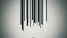 a white ball is standing in front of a barcode on the wall