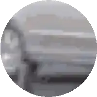 a car is parked in a parking lot in a circle with a blurred background .