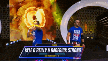 wrestlers kyle o'reilly and roderick strong are on the stage