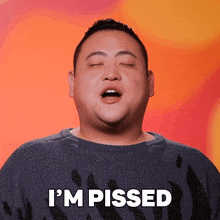 a man with his eyes closed says i 'm pissed with his mouth open