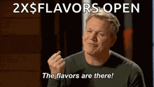 a man is making a funny face while saying the flavors are there .