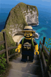 a lego figure wearing a shirt that says adventures la tiga on it