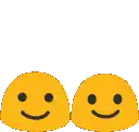 two smiley faces are standing next to each other and a heart is above them .