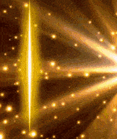 a bright yellow light is shining through a dark background
