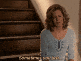 a woman sits on a set of stairs and says " sometimes you just ... "