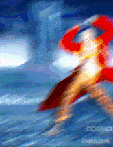 a blurry picture of a superhero with the website clideo.com written on the bottom