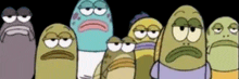 a group of cartoon characters standing next to each other with sad faces .