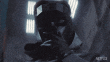 a close up of a man 's face with netflix written on the bottom right