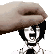 a hand is putting a piece of paper on top of a person 's head .