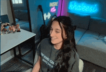 a woman wearing a t-shirt that says how hard can boys do it