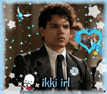 a picture of a man in a suit and tie with the words ikki irl on the bottom