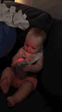 Cute Baby Playing GIF - Cute Baby Playing Remote GIFs