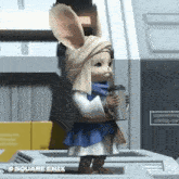 a cartoon character with bunny ears is drinking from a straw .
