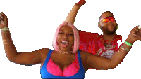a man and a woman are dancing with their arms in the air ..