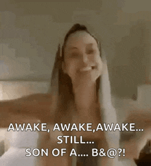 a woman with a towel on her head says awake awake awake still son of a b & @