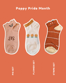 three pairs of socks are labeled pig set flower set and stripe set on a pink background