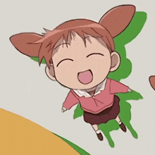 a little girl with bunny ears and a pink shirt is smiling