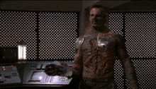a man with a name tag on his chest is holding a fireball