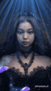 a woman in a black dress with a crown on her head is shown in a shotout app