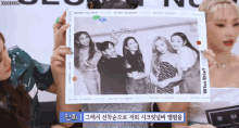 a group of girls are posing for a photo with the words who dis